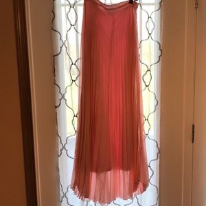 Pale pink pleated floor length skirt